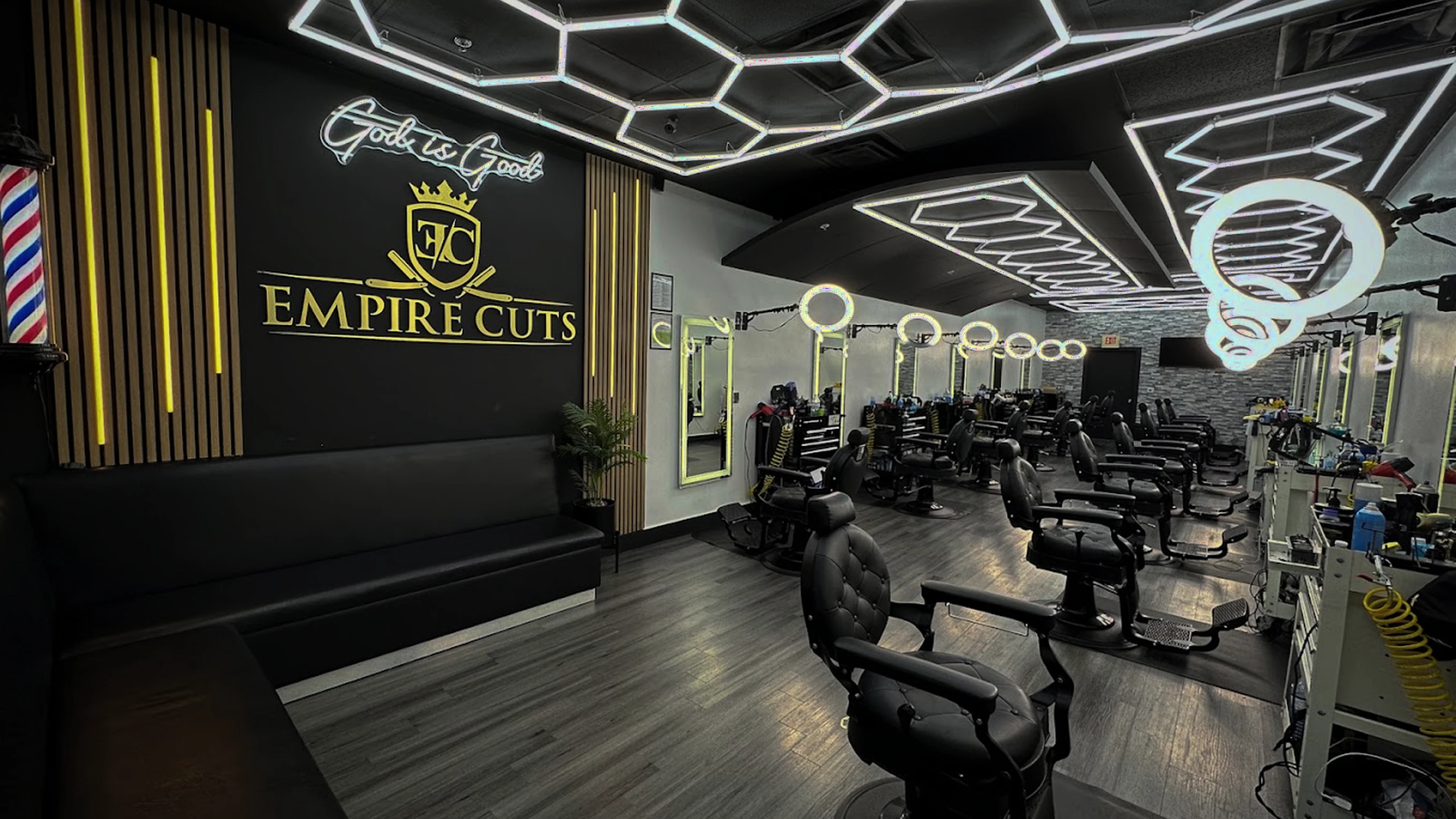 The real Empire Cuts interior with an empty foreground chair waiting for new talent